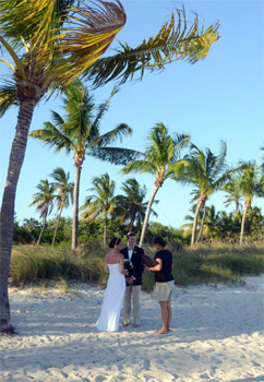 Wedding being performed on beach in Key West