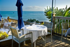 Outdoor, seaside seating at Louie's Backyard provides an exceptional fine dining experience