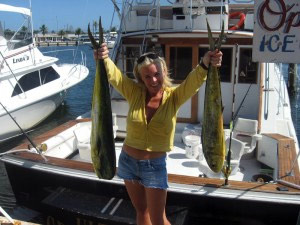 Angler with two mahi mahi, caught deep-sea fishing in Key West