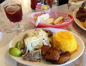 Typical meal at Cuban restaurants include roast pork and rice, as pictured here