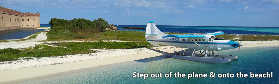 View of turquoise ocean and Fort Jefferson with seaplane in foreground