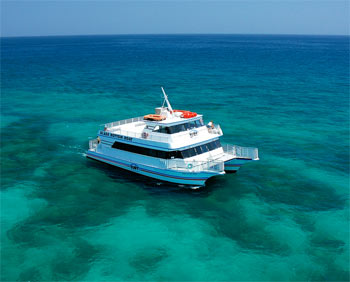 Glassbottom boat over the reef, before the sun sets